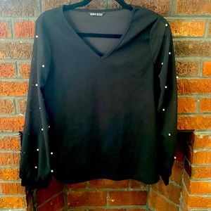 V neck blouse, mesh long sleeves with pearls. Size small.